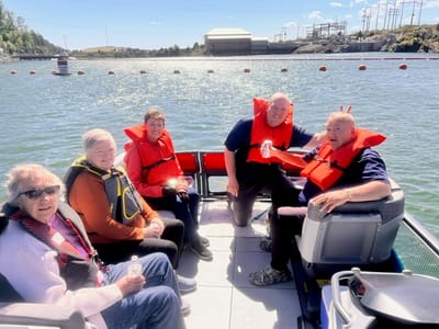 Residents enjoying a boat outing on the water