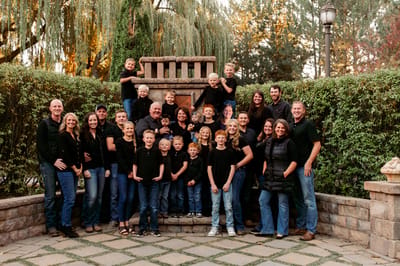 Family gathering in a garden area with a fountain