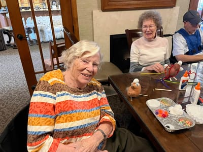 Residents participating in a craft activity