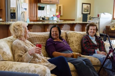 Residents enjoying conversation in a common area