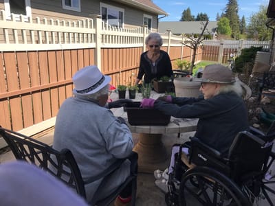 Residents gardening in an outdoor space
