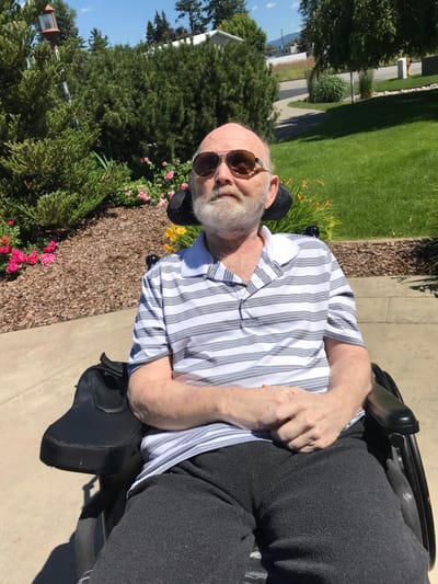 Resident enjoying a sunny day in the garden