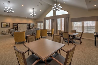 Bright common area with seating and tables