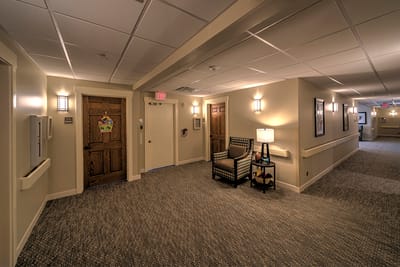 Interior hallway with seating area and decor