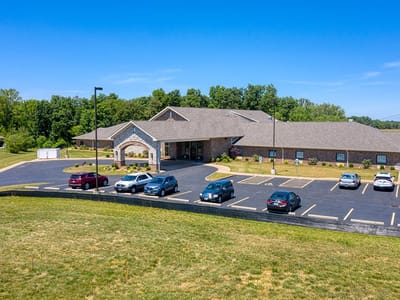 Exterior view of Cedarhurst of Waterloo with parking area