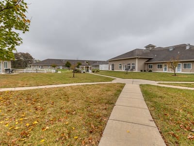 Pathway leading through the exterior grounds of Cedarhurst of Waterloo