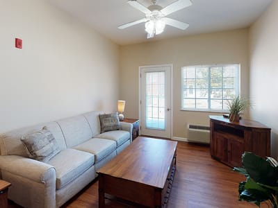 Cozy living area in a resident's room