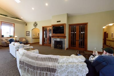 Interior common area with residents relaxing