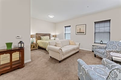 Cozy resident room with seating and decor