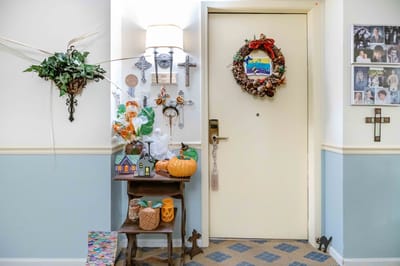 Decorated door in a senior living facility hallway