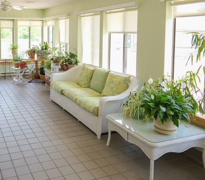 Bright common area with plants and seating