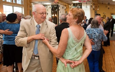 Residents dancing at a lively social event