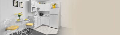 Brightened kitchen area with table and chairs