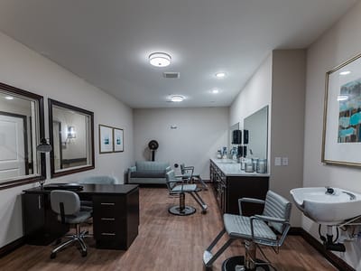 Interior view of a salon with styling chairs