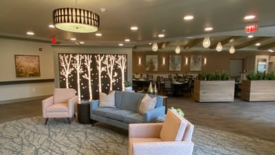 Cozy common area with seating and decorative lighting