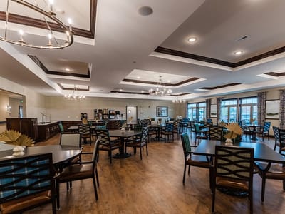 Interior dining area with tables and chairs