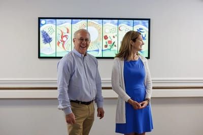 Staff and residents interacting in a common area