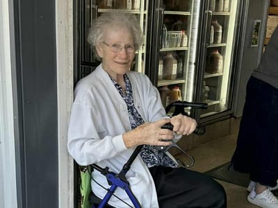 Resident smiling in a common area