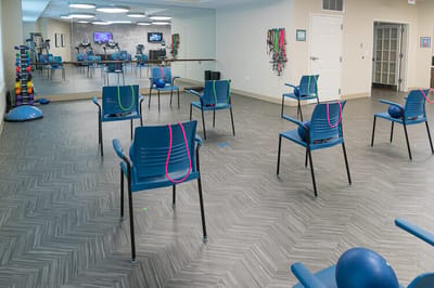 Interior view of a workout area with exercise equipment