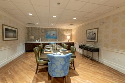 Elegant dining room setup with blue and green accents
