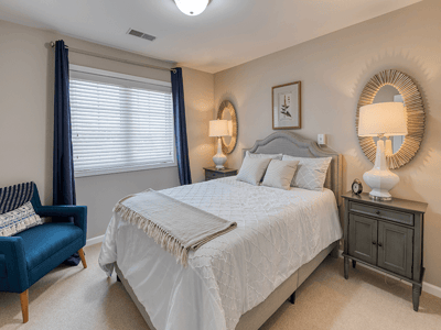 Brightly decorated bedroom in a senior living facility