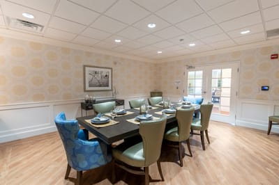 Dining area with a large table and chairs