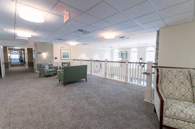 Bright interior view of a common area with seating