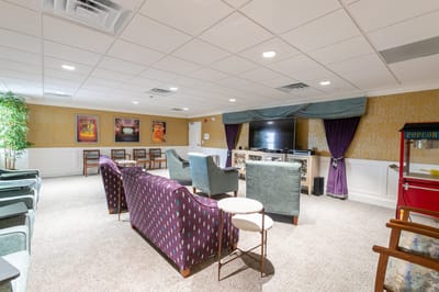 Common area with seating and entertainment setup