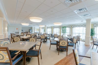 Bright dining room with tables and chairs