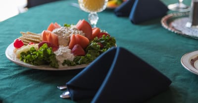 A beautifully arranged plate of food on a dining table