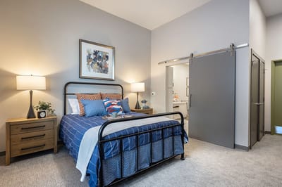 Private bedroom with a bed and decor