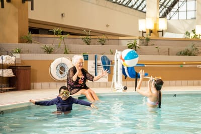 Residents enjoying a swim in the indoor pool