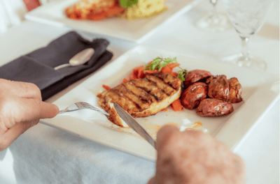 Close-up of a meal being served in a dining setting