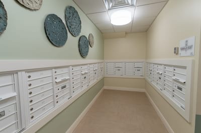 Interior hallway with mailboxes on the wall