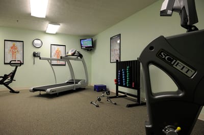 Interior view of a fitness room with equipment