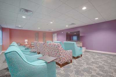 Bright common area with colorful seating