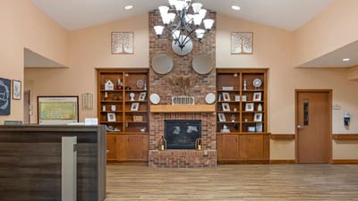 Welcoming lobby area with a fireplace and seating