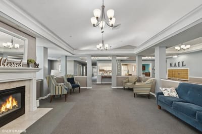 Interior view of a cozy common area with seating