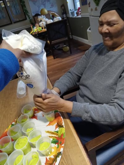 Resident engaging in a fun activity making snacks