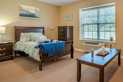 Cozy resident room with a bed and window