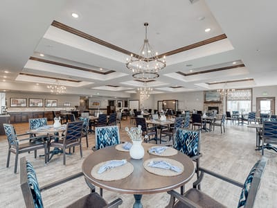 Bright dining area with modern decor and tables