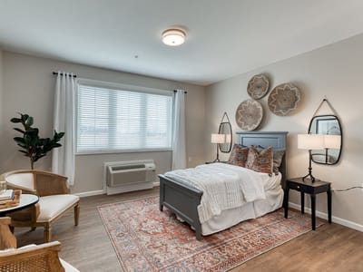 Brightly decorated resident room with elegant furnishings
