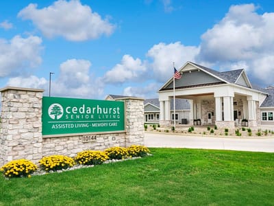 Front exterior of Cedarhurst Senior Living with sign