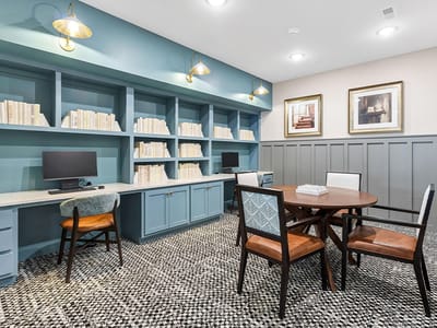 Interior common area with desks and bookshelves
