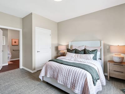 Cozy private resident room with bedding and decor