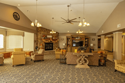 Common area with seating and fireplace