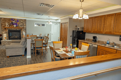 Cozy common area with dining setup and comfortable seating