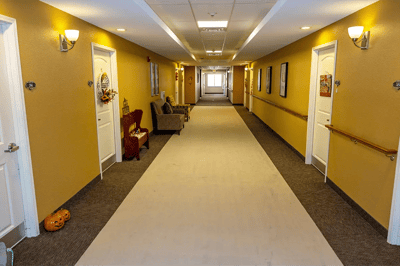 Interior hallway of the facility with decorative walls.