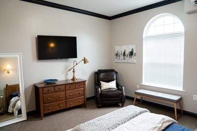 Cozy resident room with furnishings and decor