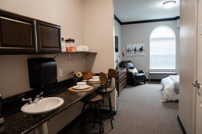 Cozy resident room with kitchen area